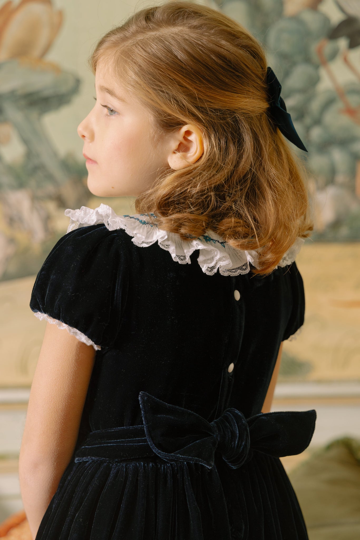 Close-up of back of Celestine Navy Velvet Smocked Dress
